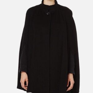 Iman Black Luxe Cape. Has 3% Cashmere, 90% cotton & 7% nylon. Never worn. M/L